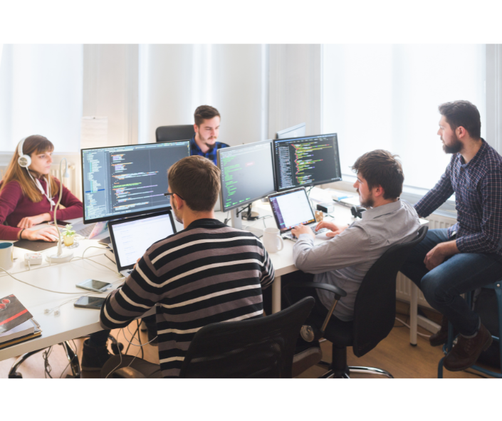 Remote software developers collaborating online using laptops and video conferencing tools, working together across different locations